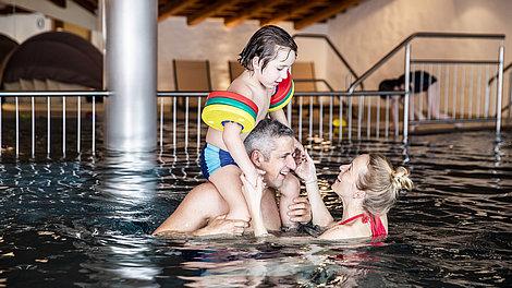 Family in the indoor pool