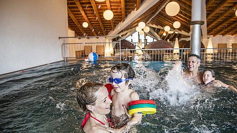 Family in the indoor pool