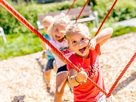 Kids swinging