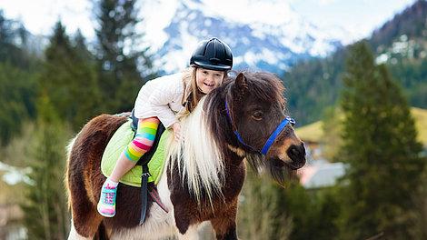 Children horse riding