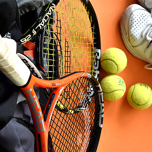 Playing tennis in Hopfgarten